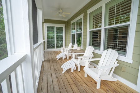 Adirondack chairs on the screened-in back porch.