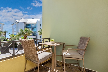 Balcony overlooking 30A with partial Gulf views.