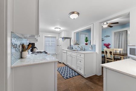 Full kitchen opens onto dining room