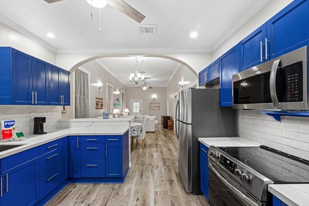 Bright beautiful kitchen open to the rest of the house