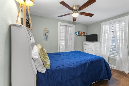 Bedroom 2 with queen bed and tv