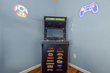 Arcade game console in bunk room