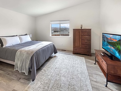 Master bedroom with queen bed