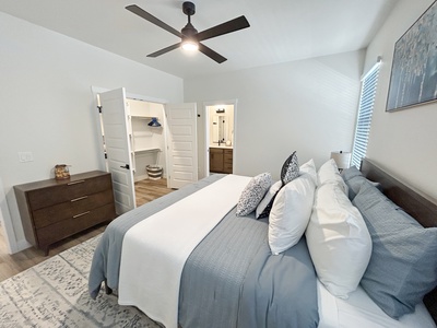 Spacious master bedroom with walk-in closet and private en suite full bathroom