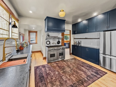 Fully stocked kitchen, new appliances, modern kitchen in restored Victorian home