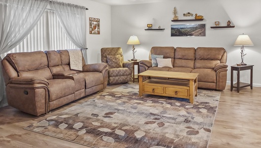 Spacious living room with open design to kitchen area