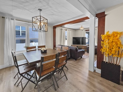 Elevated Table seating for 8 with full view of living room tv