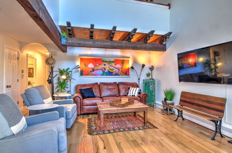 Living room with comfy sofas and smart tv