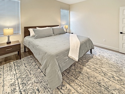 Spacious master bedroom with king bed