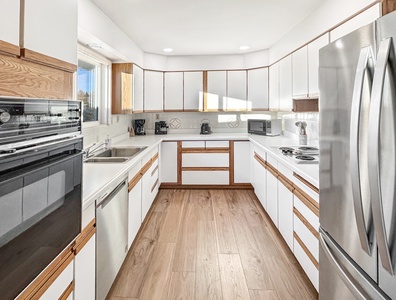 Fully stocked kitchen with old-fashioned cabinets