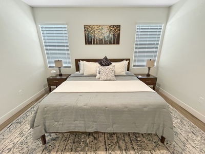 Spacious master bedroom with king bed