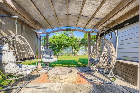 Outdoor pergola with fire pit