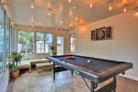 Sun Room with pool table, dart board, and A/C