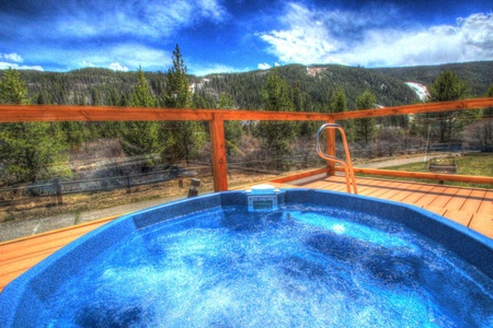 Enjoy the outdoor hot tubs and spectacular mountain views.