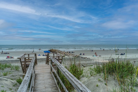 Private boardwalk to the beach from the backyard Private boardwalk to the beach from the backyard 