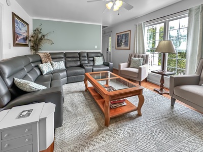 Cozy living space with plenty of seating and natural light