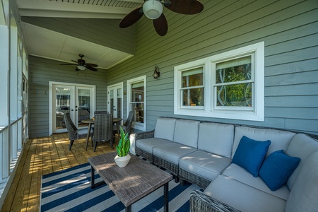 Songbird's screened in porch overlooks the 13th hole Songbird's screened in porch overlooks the 13th hole 