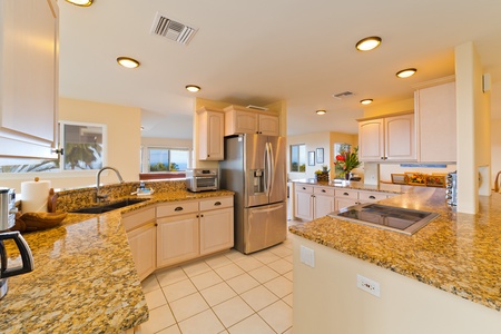 Kitchen with upscale appliances- Nicely appointed kitchen, well stocked with amenities for all your cooking needs.