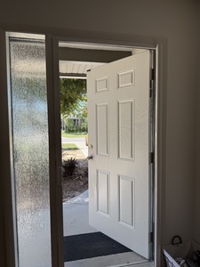 Screened in front door for ocean breezes