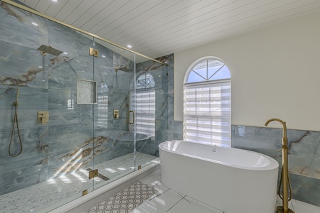 Main bath with soaking tub, step in shower