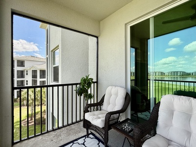 Patio off living room overlooking 9th fairway_green