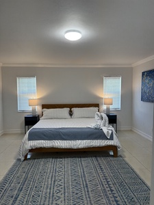 Main Bedroom King Bed with private full bathroom