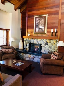 Cozy seating by the fire in the spacious open Great  Room