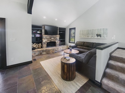 Cozy Living Room with Wood Burning Fireplace