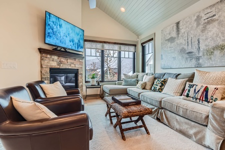 Cozy Living Room with Big Screen TV and Fireplace!