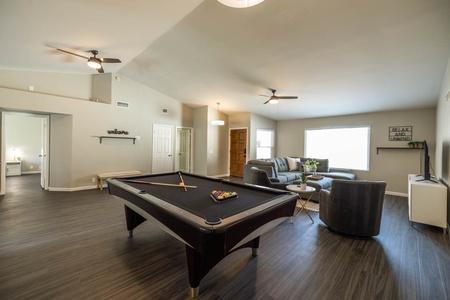 Open concept living room/pool table room area