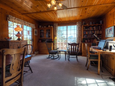 Great Room with two desks and two rocking chairs