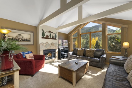 Cozy living room with large windows for some amazing views