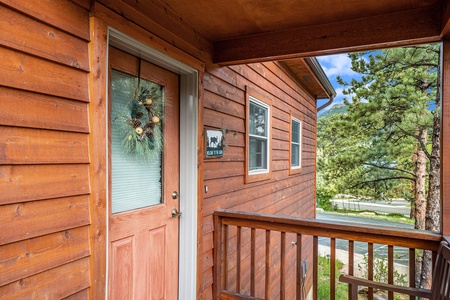 Front door, with small front porch.