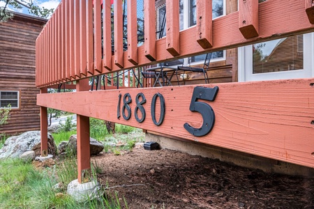 Cabin number on patio railing.