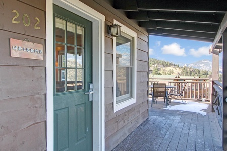 Condo's front entrance from shared deck.