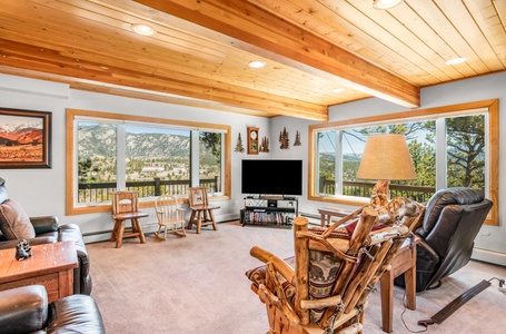 Living room with extra seating and a flat screen TV