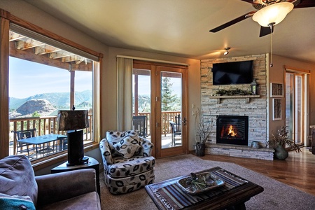 Enter info this open concept unit with fabulous views, gas fireplace, queen sleeper sofa and chair. 