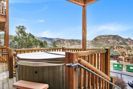 Soak up surrounding mountain views from the condo's private hot tub.