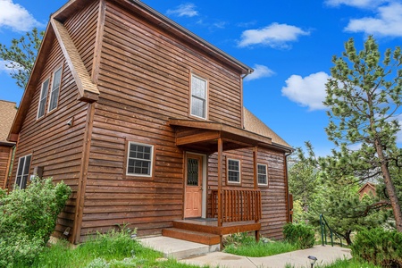 Exterior of Eagle 7, with front door and small porch.