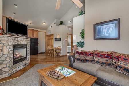 Enter into your living area with queen sofa sleeper, gas fireplace, and flat screen TV.