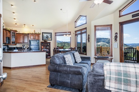 Entry opens to living room and kitchen and dining area. 