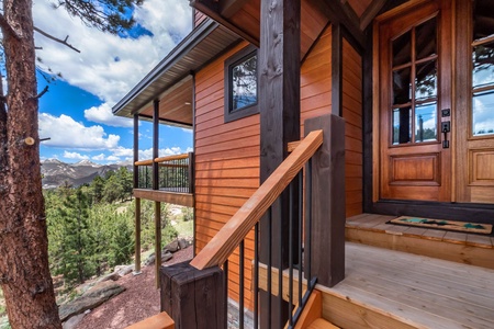 Home with gorgeous views. Front door view - guests will enter through garage.