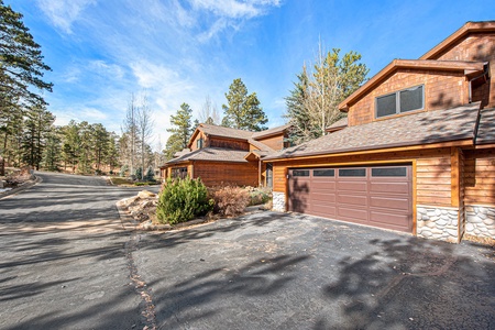 Fall River Retreat in Estes Park, Parking is available for two vehicles on the driveway. No garage access for guests.