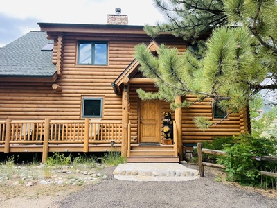 Main entrance to home, 4 steps up to front door.