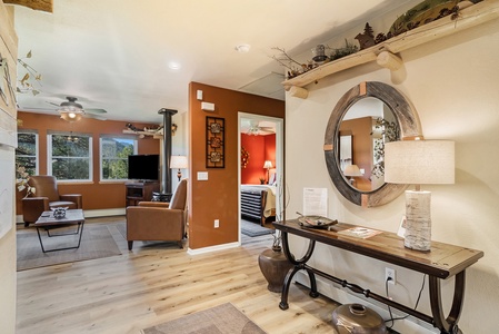 This cute hallway off the main entrance leads you in to the living room.