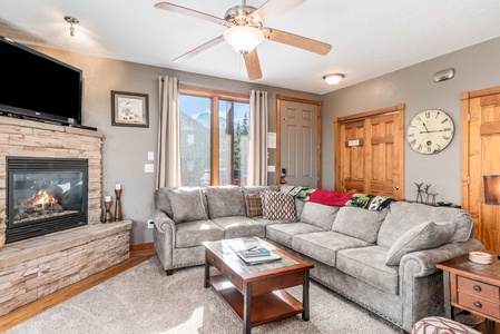 The living room offers a comfortable L shaped sofa with queen sleeper right inside the front door. Snuggle up and enjoy the mountain views, the gas fireplace and flat screen TV.