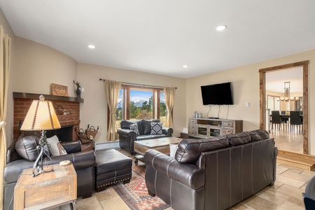 Snowline Vista Lodge Estes Park, this living room features a flat screen TV. 