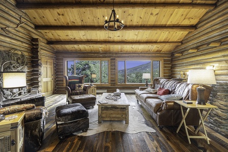 Broadmeadow Cabin Estes Park, Spacious great room phenomenal mountain views plentiful sofa seating. wood burning fireplace.