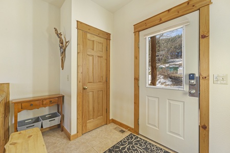 Front door into condo's entry room. 