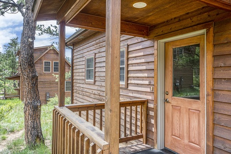 Front door, with small front porch.